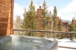 Enjoy a soak after a long day in the private hot tub